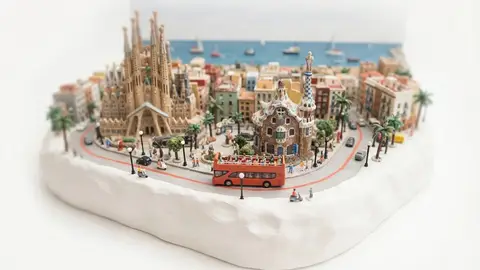 Miniature model of Barcelona with an orange sightseeing bus