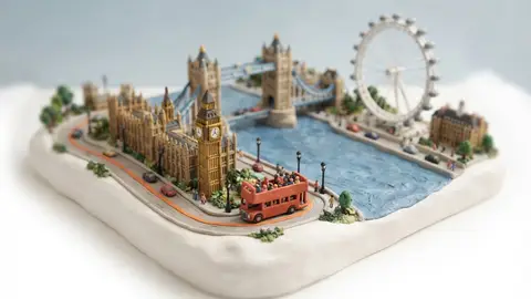Miniature model of London with an orange sightseeing bus