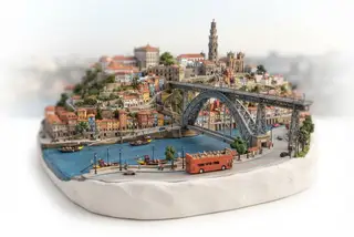 Miniature model of Porto with an orange sightseeing bus