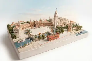 Miniature model of Seville with an orange sightseeing bus